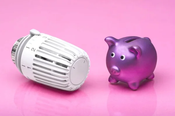 Piggy Bank Next Thermostat Heating Home Pink Background Rising Costs — Stock Photo, Image