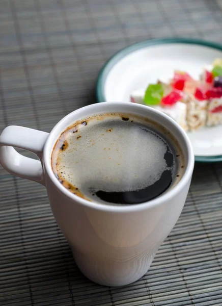 Filiżankę kawy i deser — Zdjęcie stockowe