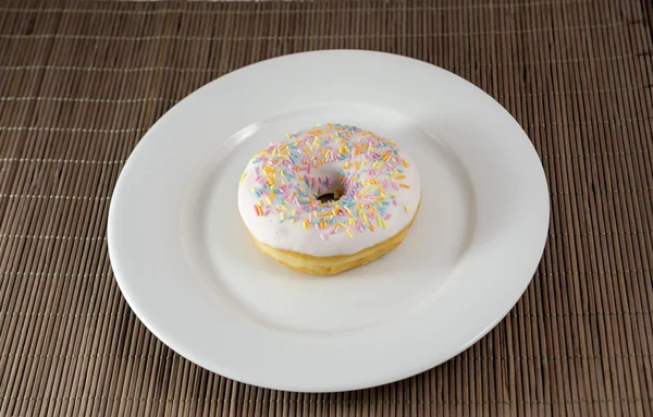 Donut on the plate — Stock Photo, Image