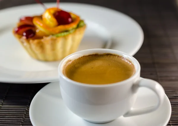 Cup of espresso and dessert — Stock Photo, Image