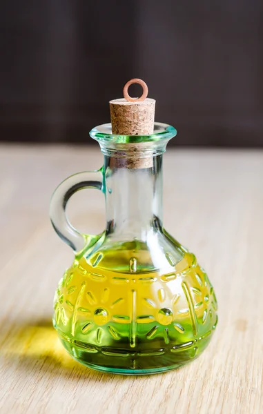 Small bottle of olive oil with cork stopper — Stock Photo, Image