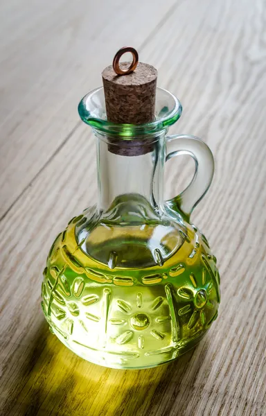 Small bottle of olive oil with cork stopper — Stock Photo, Image