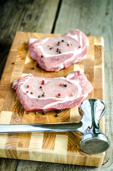 Raw pork steaks — Stock Photo, Image