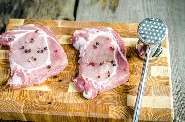 Raw pork steaks — Stock Photo, Image