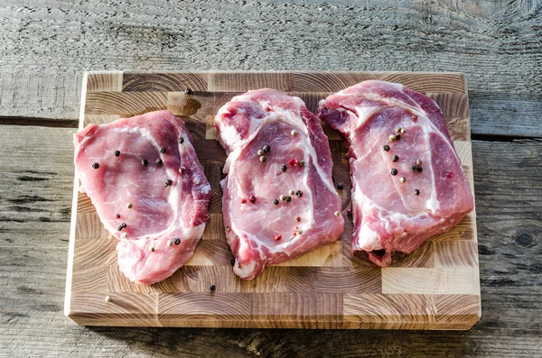 Raw pork steaks — Stock Photo, Image