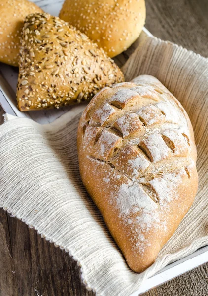 Wholewheat bread with sesame and flax-seed buns — Stock Photo, Image