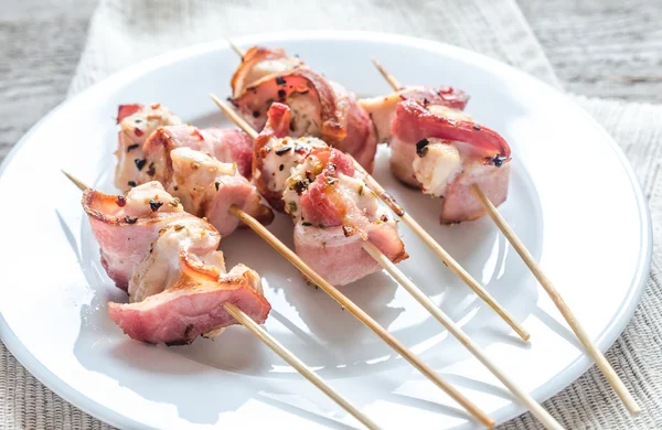 Grilled bacon skewers with chicken meat — Stock Photo, Image