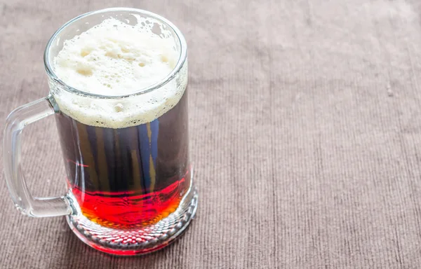 Mug with dark beer — Stock Photo, Image