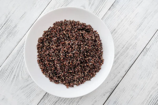 Teller Mit Schwarzer Quinoa Auf Weißem Tisch — Stockfoto