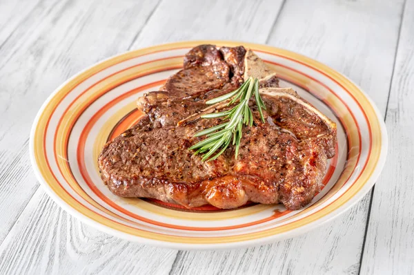 Pan Fried Bone Steak Fresh Rosemary Pepper Plate — Stock Photo, Image