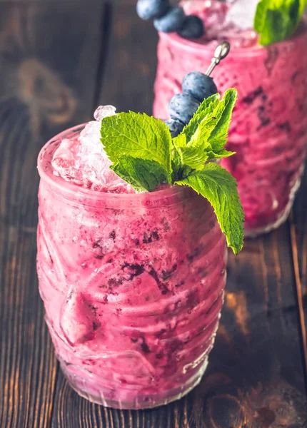 Two Blueberry Colada Cocktails Garnished Mint — стоковое фото
