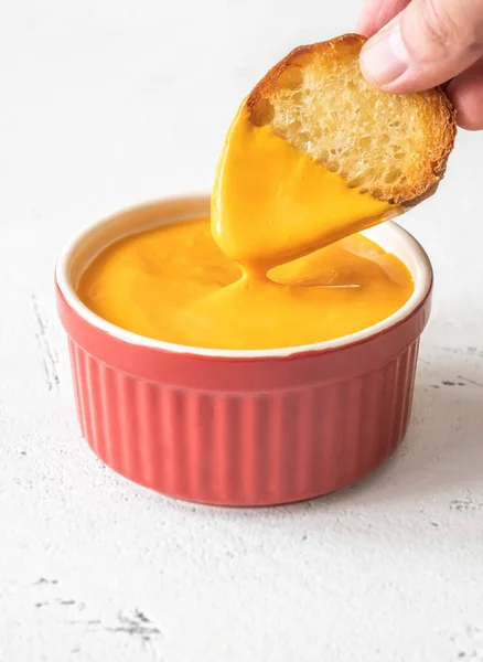 Toasted Bread Dipping Cheddar Cheese Sauce — стоковое фото