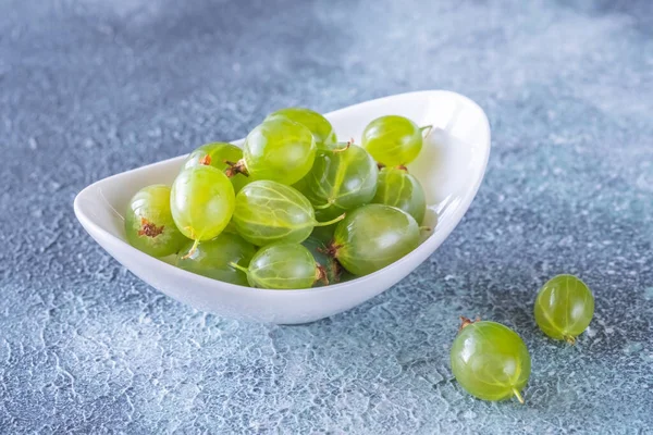 Bowl Fresh Gooseberry Blue Gray Background — Foto de Stock