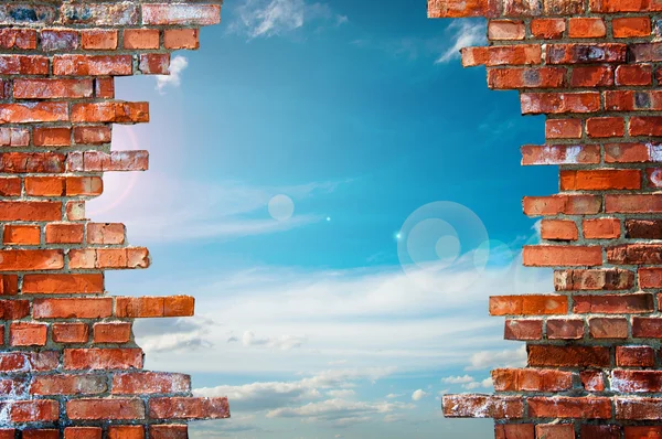 Brick wall with hole — Stock Photo, Image