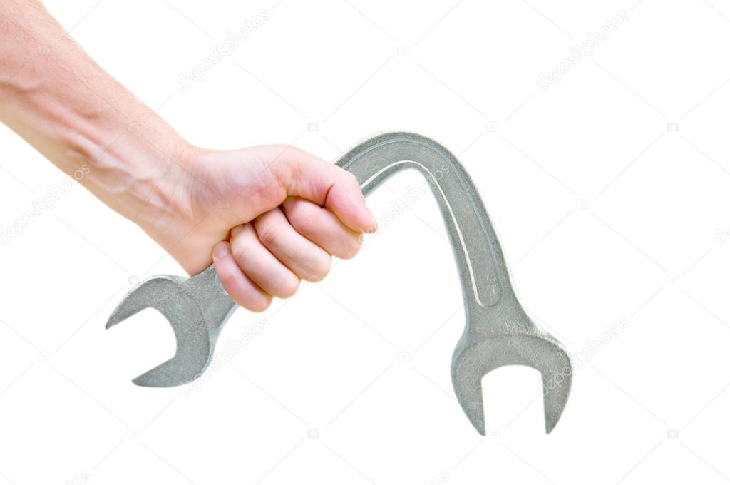 bent wrench in hand