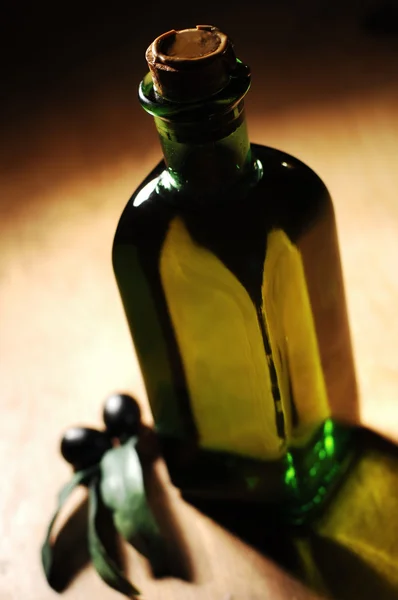 Olive Oil Bottle on the Table — Stock Photo, Image