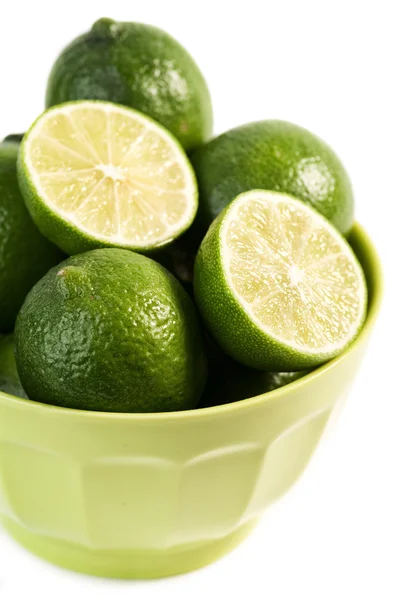 Bowl of fresh and juicy limes — Stock Photo, Image