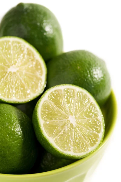Bowl of fresh and juicy limes — Stock Photo, Image