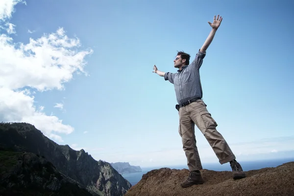 Man reaching out for the sky — Stock Photo, Image