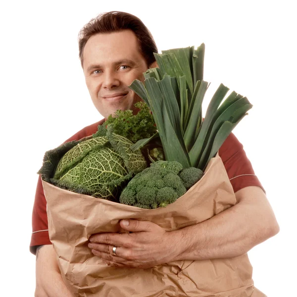 Sacchetto uomo pieno di verdure — Foto Stock
