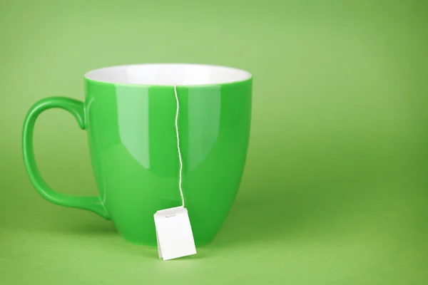 Green Tea cup on green background — Stock Photo, Image