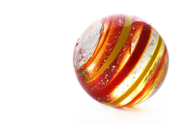 Striped glass marble on white — Stock Photo, Image