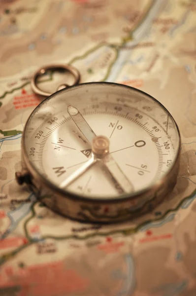 Old compass on map Royalty Free Stock Images