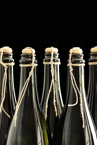 Hand corked and tied champagne bottles — Stock Photo, Image