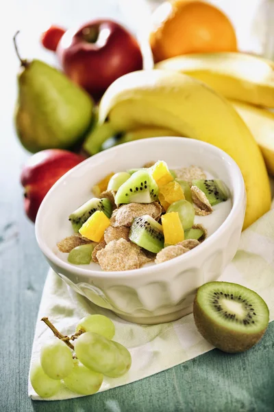 Spelt Cornflakes with milk and fruit — Stock Photo, Image