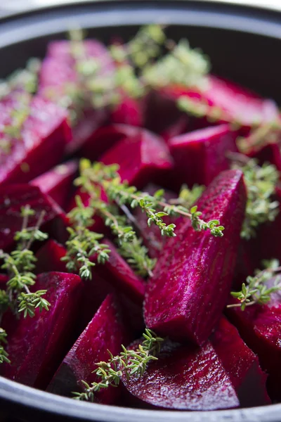 Food: Raw Beetroot and Thyme in a Tagine, ready to be stewed — Stock Photo, Image