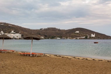 Sandy beach and sea bay of Chora town on Ios Island. Cyclades, Greece