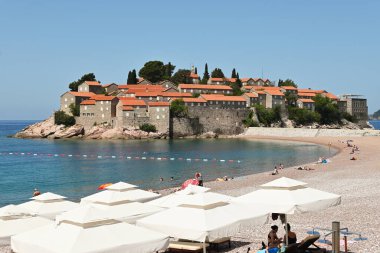 Sveti Stefan, Montenegro - June 6, 2022: Sveti Stefan beach overlooking the islet