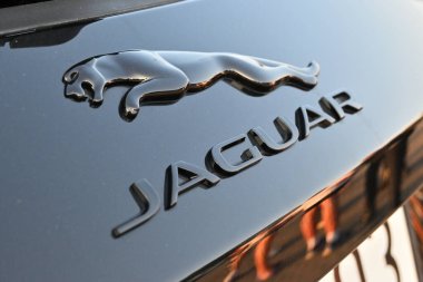 Gdansk, Poland - August 12, 2022: Jaguar metallic logo closeup on the Jaguar car