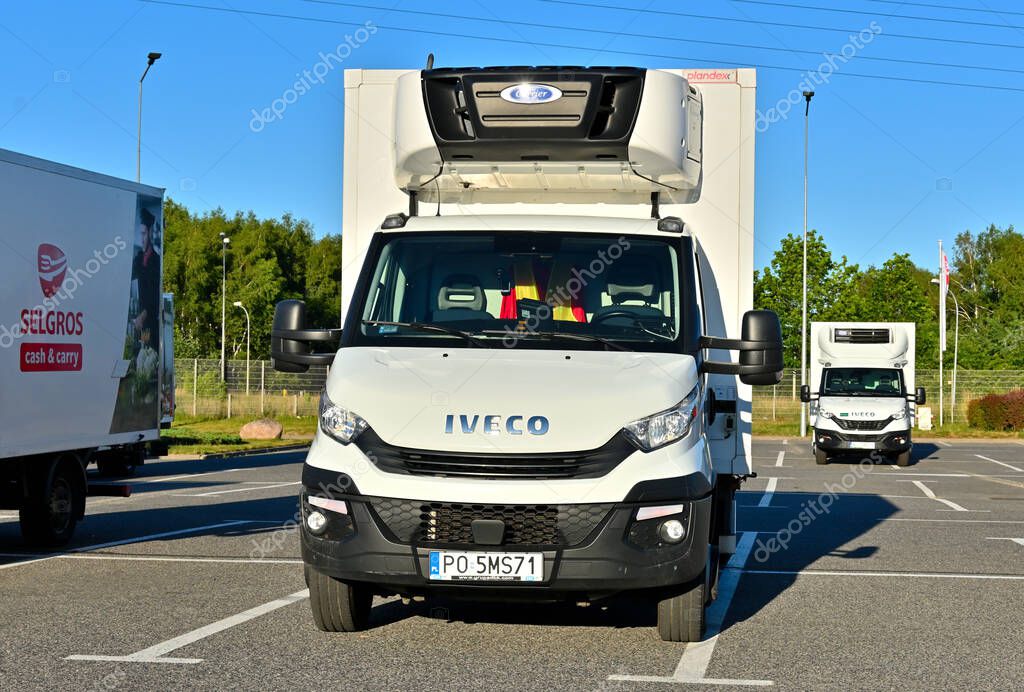 Gdansk, Poland, 2 July, 2022: Box trucks of the corporate fleet of the Selgros company used as delivery vans for self-supply and customer delivery