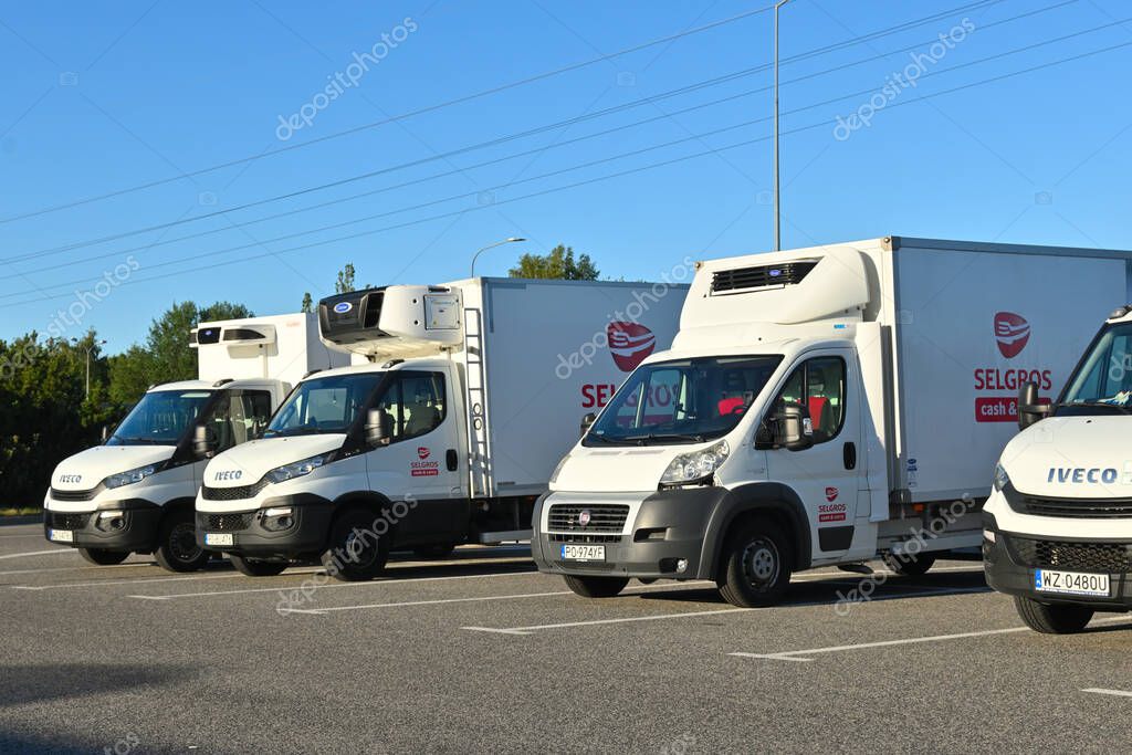 Gdansk, Poland, 2 July, 2022: Box trucks of the corporate fleet of the Selgros company used as delivery vans for self-supply and customer delivery