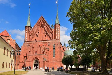 Frombork, Poland - August 15, 2022: The Cathedral complex in Frombork, a historical monument museum of medieval buildings. Nicolaus Copernicus Museum. Poland
