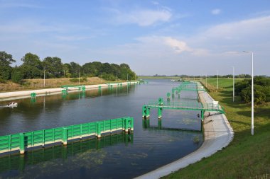The canal of the historic sluice in Przegalina for ships sailing at different water levels between the Vistula and the Martwa Wisla. Poland
