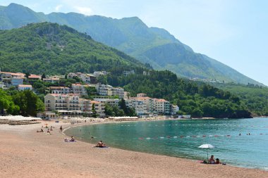 Sveti Stefan, Montenegro - June 6, 2022: Sveti Stefan beach, one of the most beautiful beaches in Montenegro. Europe
