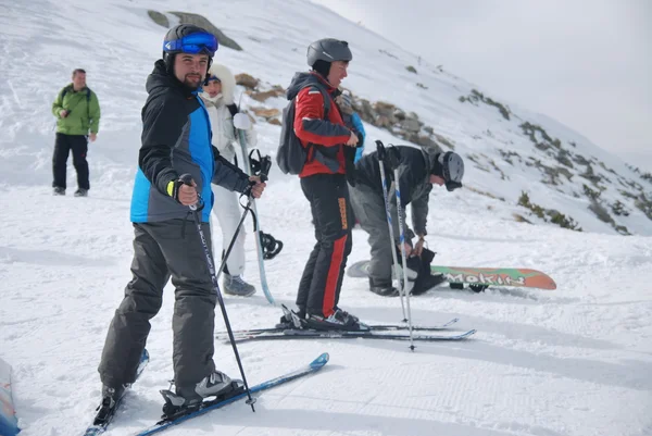 Group of young people on the mountain top Todorka Bansko ski resort in Bulgaria — Stock Photo, Image