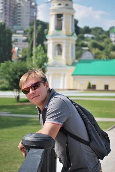 Young man with iPad during a tour of the city of Voronezh — Stock Photo, Image