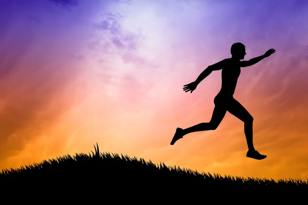 Man running at sunset — Stock Photo, Image