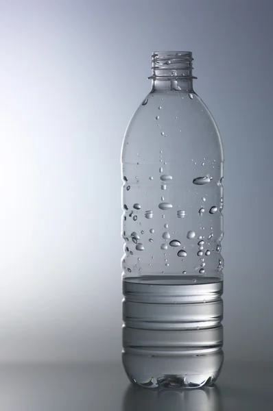 Half-empty bottle — Stock Photo, Image