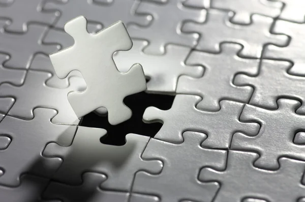 Illuminated puzzle piece.(horizontal) — Stock Photo, Image