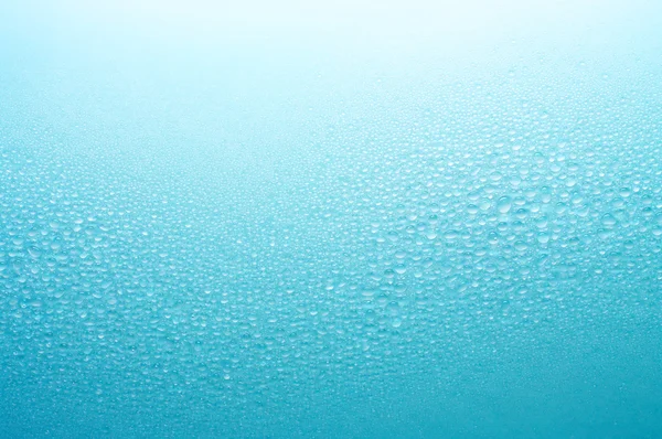 Small water drops arranging in the form of wave. — Stock Photo, Image