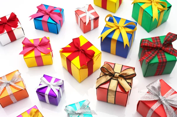 Many gifts on white background. — Stock Photo, Image