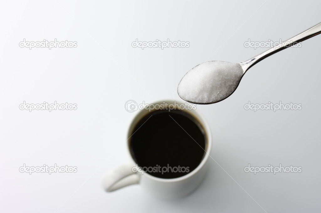 Black coffee and spoonful of sugar