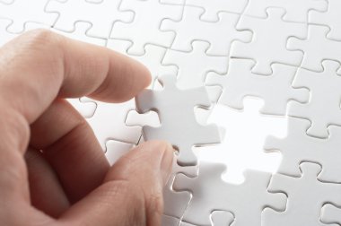 A person matching the last puzzle pieces. clipart