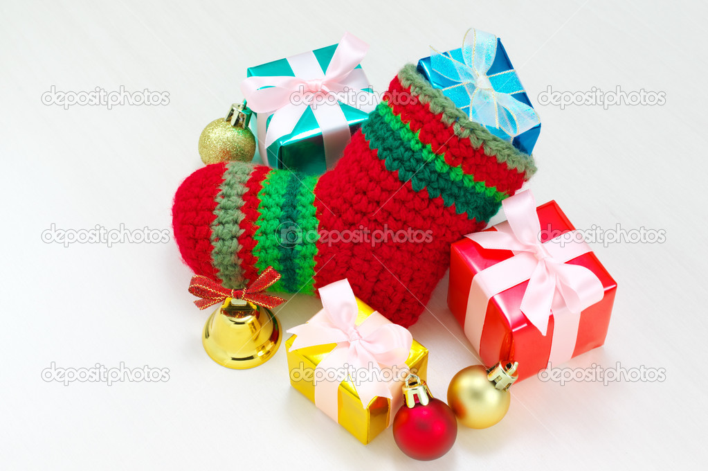 Christmas stocking and colorful christmas presents.