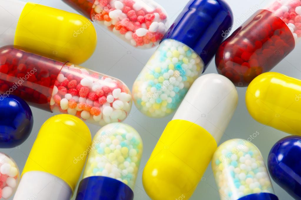 Closeup of colorful capsule medicines. — Stock Photo © Tadamichi 45079005