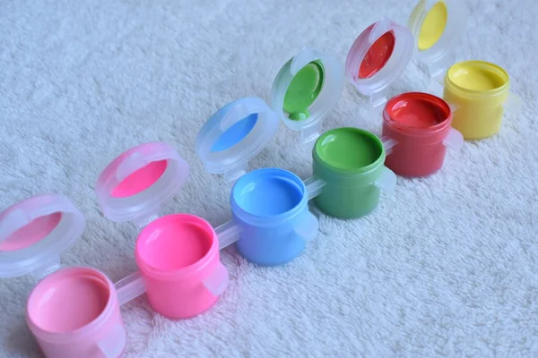 a bright set of acrylic paints for drawing